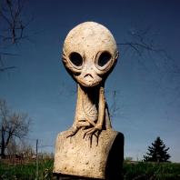 Midjourney. Prompt: an alien sculpture left in someone’s yard